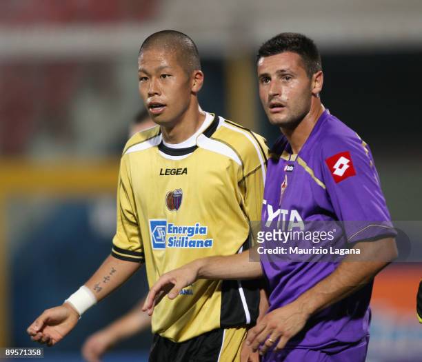 Takayuki Morimoto of Catania and Manuel Pasquali of Fiorentina in action during Dahlia Cup match played between Catania and Fiorentina at Angelo...