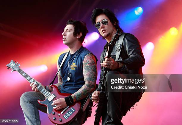Zacky Vengeance and Synyster Gates of Avenged Sevenfold performs on stage at Knebworth House on August 2, 2009 in Stevenage, England.