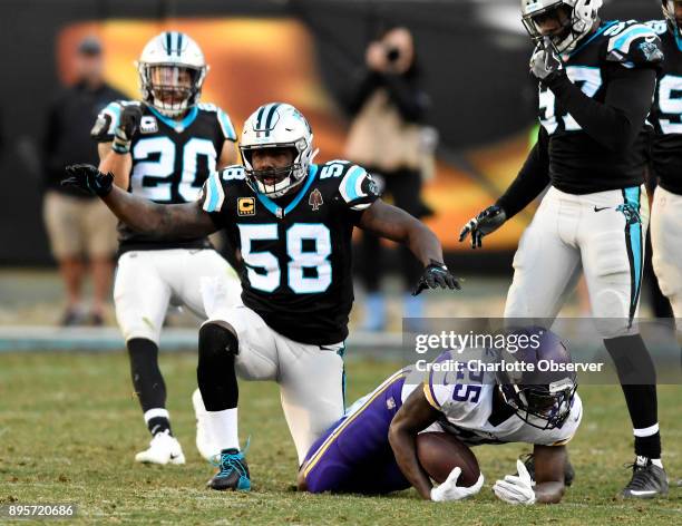 Carolina Panthers outside linebacker Thomas Davis celebrates his tackle of Minnesota Vikings running back Latavius Murray on December 10 at Bank of...