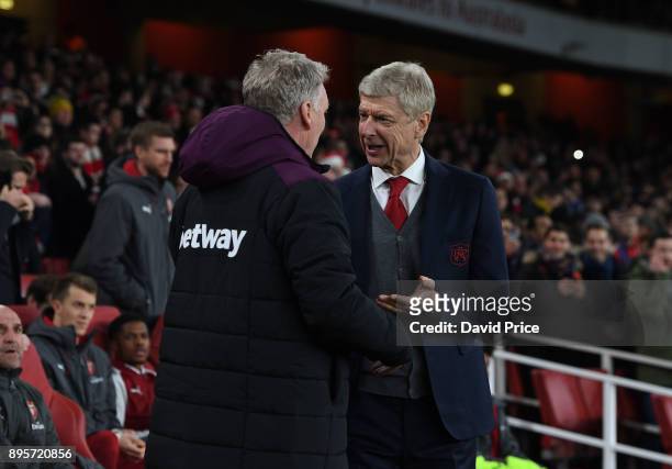 Arsene Wenger the Arsenal Manager with David Moyes the West Ham Manager before the Carabao Cup Quarter Final match between Arsenal and West Ham...