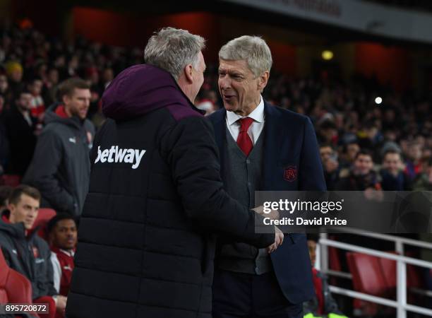 Arsene Wenger the Arsenal Manager with David Moyes the West Ham Manager before the Carabao Cup Quarter Final match between Arsenal and West Ham...