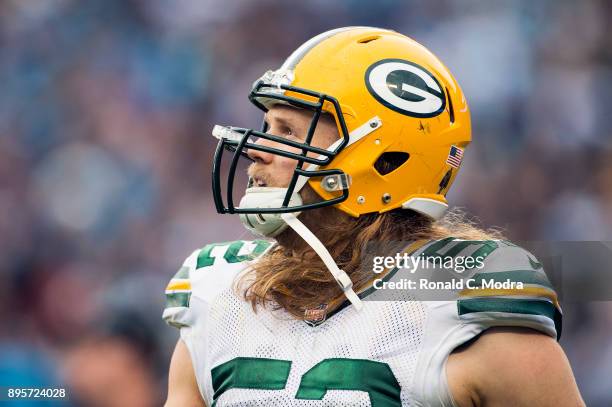 Linebacker Clay Matthews of the Green Bay Packers looks on against the Carolina Panthers during a NFL game at Bank of America Stadium on December 17,...