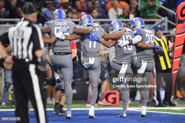 Detroit Lions wide receiver T.J. Jones celebrates his touchdown with Detroit Lions running back Theo Riddick , Detroit Lions wide receiver Marvin...