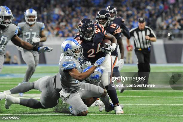 Detroit Lions cornerback Nevin Lawson tackles Chicago Bears running back Jordan Howard during a game between the Chicago Bears and the Detroit Lions...