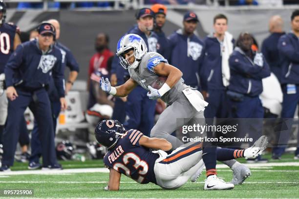 Detroit Lions wide receiver Golden Tate avoids a tackle from Chicago Bears cornerback Kyle Fuller during a game between the Chicago Bears and the...