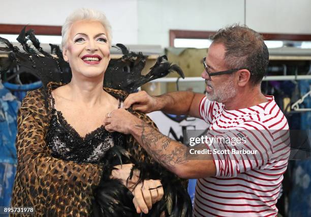 Tony Sheldon as "Bernadette" is assisted into his outfit by costume designer Tim Chappel during rehearsals for Priscilla Queen Of The Desert on...