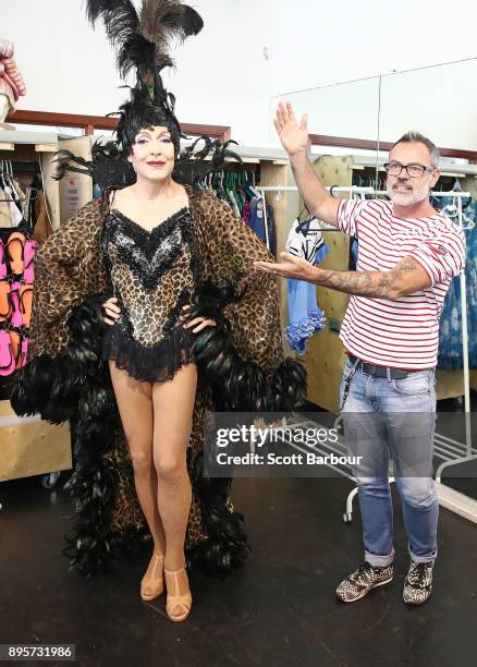 Tony Sheldon as "Bernadette" is assisted into his outfit by costume designer Tim Chappel during rehearsals for Priscilla Queen Of The Desert on...