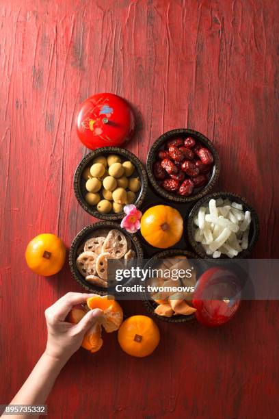 flat lay chinese new year food and drink still life. - lunar new year cup 2017 stock-fotos und bilder