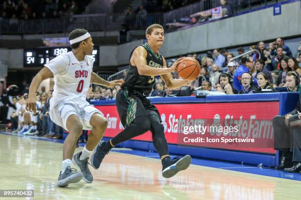 Cal Poly Mustangs forward Mark Crowe passes the ball during the game between SMU and Cal Poly on December 19 at Moody Coliseum in Dallas, TX.
