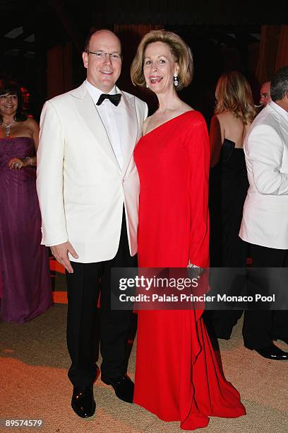 Prince Albert II of Monaco and American Red Cros President Bonnie Mc Elveen Hunter arrive at the 61st Monaco Red Cross Ball at the Monte-Carlo...