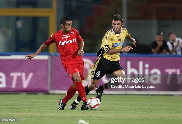 Gennaro Delvecchio of Catania and Capucho Neves Jeda of Cagliari in action during Dahila Cup match played between Catania and Cagliari at Angelo...