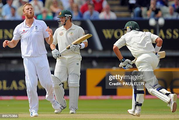 England bowler Andrew Flintoff reacts after bowling to Australian batsman Mike Hussey on the final day of the third Ashes cricket test between...