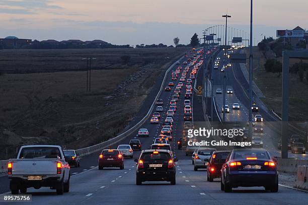 Traffic moves along a freeway on July 29, 2009 in Gauteng, South Africa. Motorists have had to become used to highway construction zones as many...