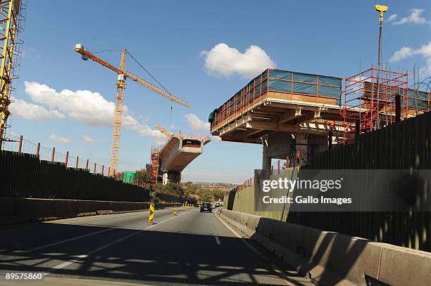 Traffic moves along a highway on July 29, 2009 in Gauteng, South Africa. Motorists have had to become used to highway construction zones as many...