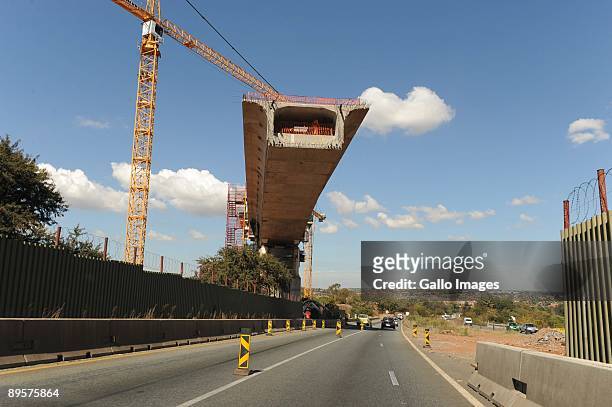 Traffic moves along a highway on July 29, 2009 in Gauteng, South Africa. Motorists have had to become used to highway construction zones as many...