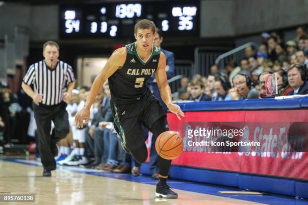 Cal Poly Mustangs forward Mark Crowe brings the ball up court during the game between SMU and Cal Poly on December 19 at Moody Coliseum in Dallas, TX.
