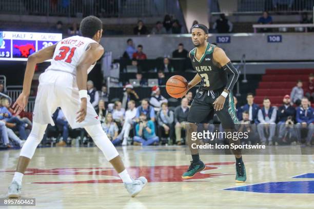 Cal Poly Mustangs guard Donovan Fields brings the ball up court during the game between SMU and Cal Poly on December 19 at Moody Coliseum in Dallas,...