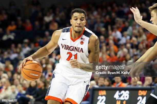 Isaiah Wilkins of the Virginia Cavaliers dribbles in the first half during a game against the Davidson Wildcats at John Paul Jones Arena on December...