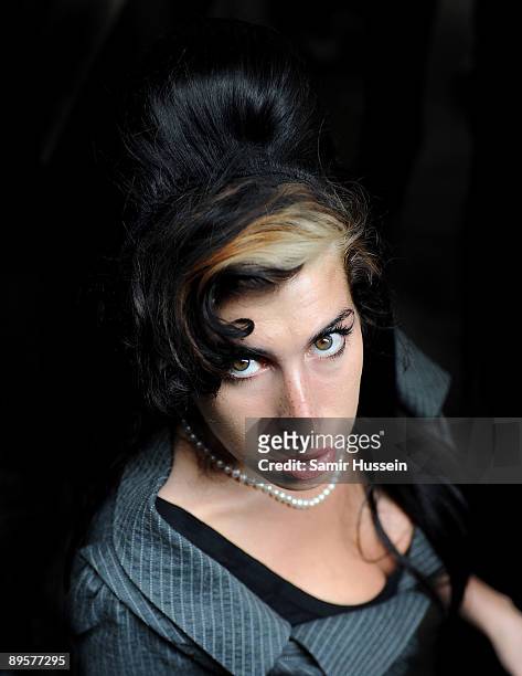 Amy Winehouse attends court to face assault charges at Westminster Magistrates Court on July 23, 2009 in London, England.