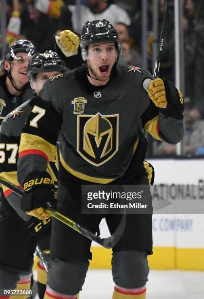 Shea Theodore of the Vegas Golden Knights celebrates after scoring on a power-play goal with 2.3 seconds left in the third period to beat the Tampa...