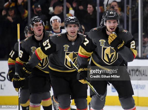 Shea Theodore of the Vegas Golden Knights celebrates after scoring on a power-play goal with 2.3 seconds left in the third period to beat the Tampa...