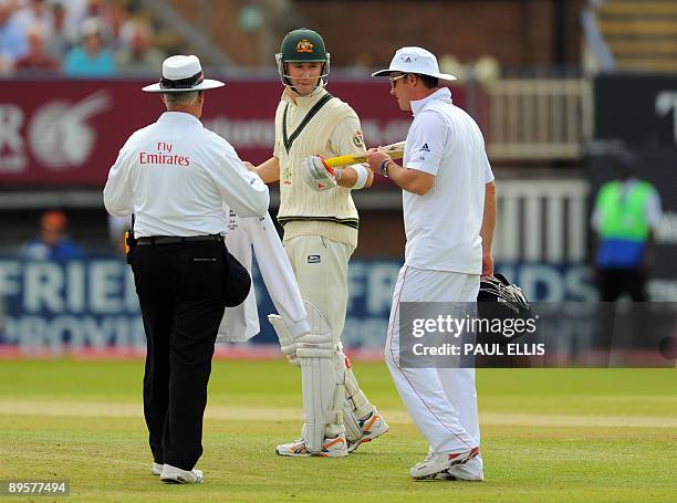 Australian batsman Michael Clarke exchanges words with England's captain Andrew Strauss after a close decision on the final day of the third Ashes...