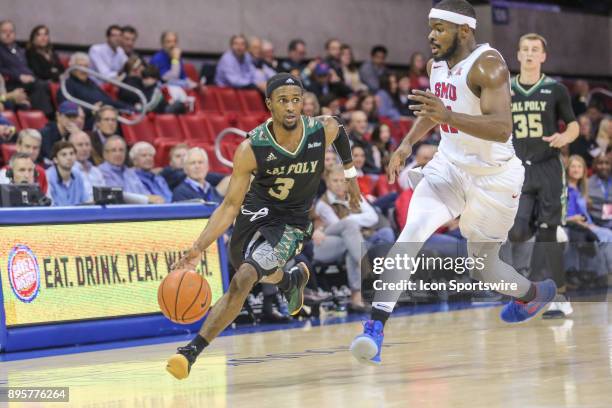 Cal Poly Mustangs guard Donovan Fields drives to the basket during the game between SMU and Cal Poly on December 19 at Moody Coliseum in Dallas, TX.