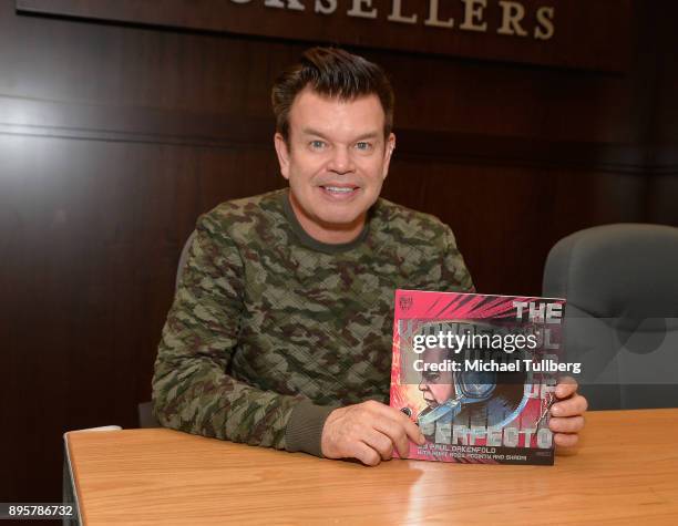 Electronic music artist Paul Oakenfold attends a signing event for his new graphic novel "The Wonderful World Of Perfecto" at Barnes & Noble at The...