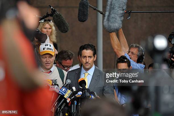 Attorney of Debbie Rowe, Eric George speaks to the press outside of Los Angeles Superior Court following a hearing to finalize an agreement for...