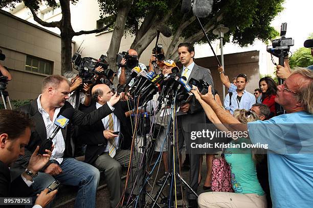 Attorney of Debbie Rowe, Eric George speaks to the press outside of Los Angeles Superior Court following a hearing to finalize an agreement for...