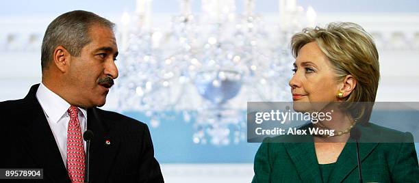 Foreign Minister of Jordan Nasser Judeh speaks as U.S. Secretary of State Hillary Rodham Clinton listens during a joint press availability at the...