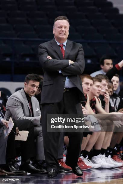 Lewis University Flyers head coach Scott Trost reacts after a play during a college basketball game between the Northwestern Wildcats and the Lewis...