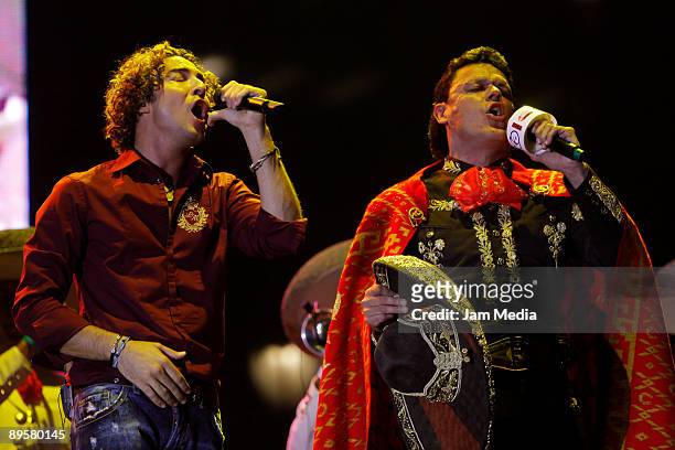 David Bisbal and Pedro Fernandez perform during the Mexico City: Full of Life concert held at the Angel de la Independencia on August 2, 2009 in...