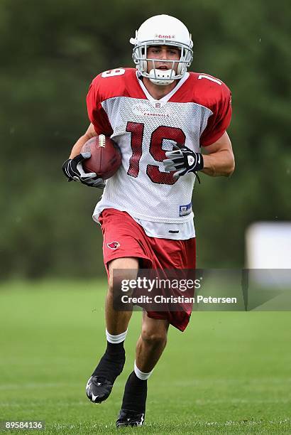 Wide receiver Lance Long of the Arizona Cardinals runs with the ball after a reception in the team training camp at Northern Arizona University on...