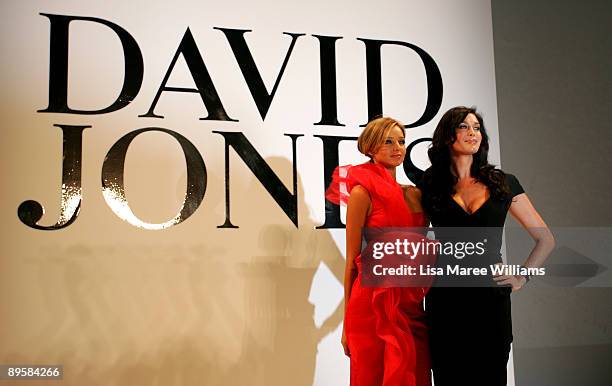 Models Miranda Kerr and Megan Gale showcase designs by Alex Perry on the catwalk at the David Jones Spring/Summer 2009 Collection Launch themed 'A...