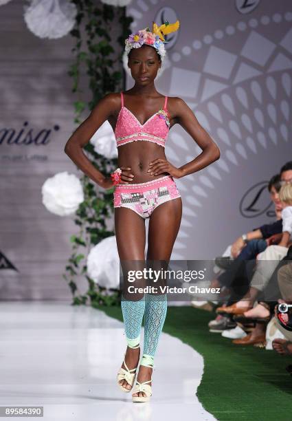 Model walks the runway wearing Leonisa during the 3rd day of Colombia Moda 2009 at Plaza Mayor on July 29, 2009 in Medellin, Colombia.