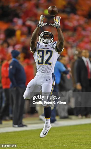 Running back Branden Oliver of the Los Angeles Chargers warms up prior to a game against the Kansas City Chiefs at Arrowhead Stadium on December 16,...