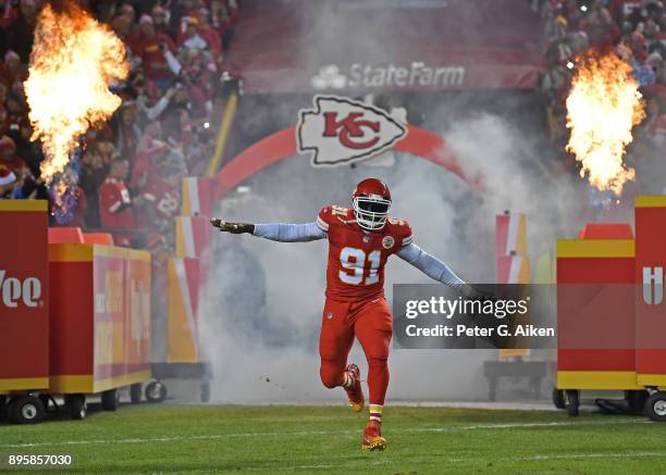 Outside linebacker Tamba Hali of the Kansas City Chiefs is introduced prior to a game against the Los Angeles Chargers at Arrowhead Stadium on...