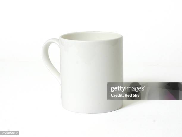 a white mug on a white background - kaffeepause stock-fotos und bilder