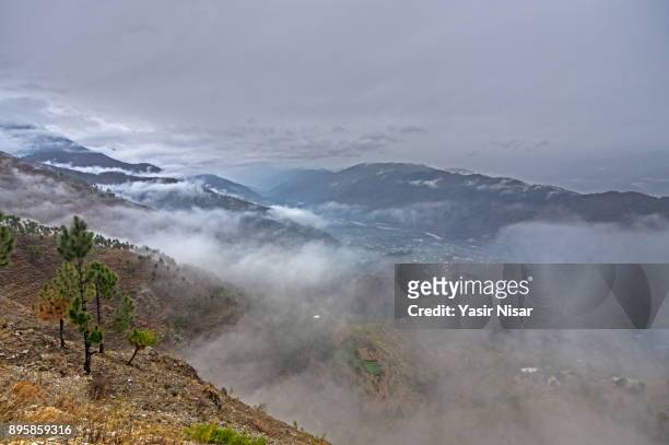 foggy misty landscape of kashmir after snowfall - yasir nisar stock pictures, royalty-free photos & images