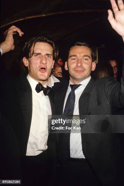 Frederic Beigbeder and Jean Francois Coppe attend a Caca's Club Party at Castel Club in the 1990s in Paris, France.