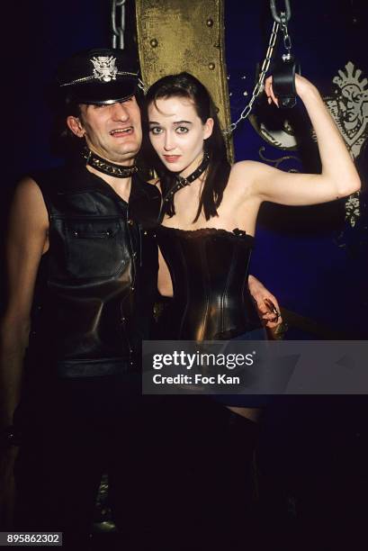 Frederic Beigbeder and Diane de Mac Mahon attend La Nuit des Punitions Interminables a Caca's Party at Le Queen Club in the 1990s in Paris, France.