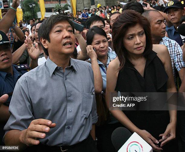 Ferdinand 'Bong-Bong' Marcos Jr. And Imee Marcos , the children of the late Philippine president Ferdinand Marcos, leave the Manila Cathedral after...