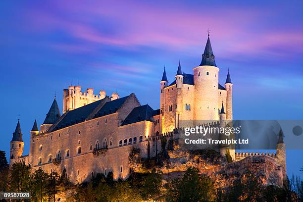 segovia castle illuminated - alcazar castle stock pictures, royalty-free photos & images