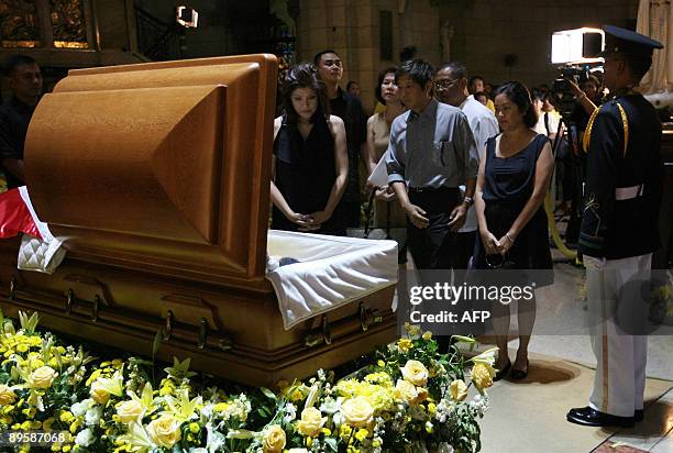 Ferdinand 'Bong-Bong' Marcos Jr. And Imee Marcos , the children of the late Philippine president Ferdinand Marcos, view the remains of the late...