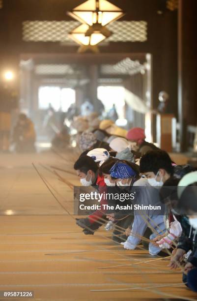 Buddhist monks and practitioners attend the annual dusting at Higashi Honganji Temple on December 20, 2017 in Kyoto, Japan. The dusting is in a...