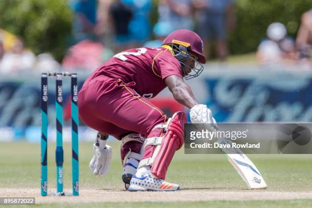 Rovman Powell of West Indies makes a run during the first match in the One Day International series between New Zealand and the West Indies at Cobham...