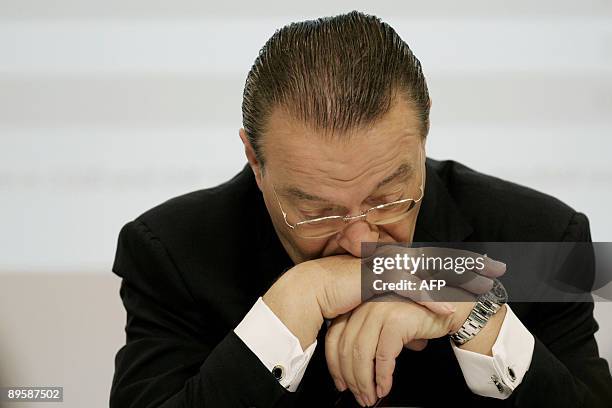 Chief operating officer of Switzerland's UBS bank Oswald Gruebel looks on during the announcing of the bank's half year results for the first half of...