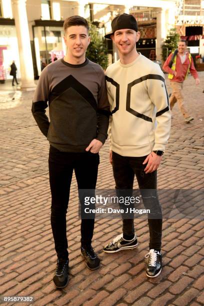 Dance duo Twist and Pulse attend 'The Greatest Showman' flashmob at Covent Garden on December 18, 2017 in London, England.
