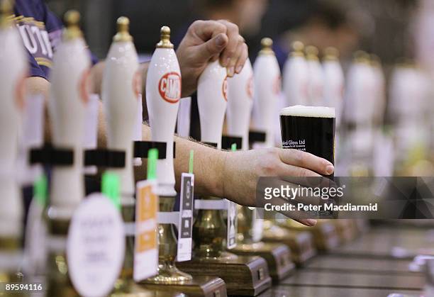 Pint is pulled for a visitor to the Great British Beer Festival on August 4, 2009 in London. The festival is organised by CAMRA who have 100,000...